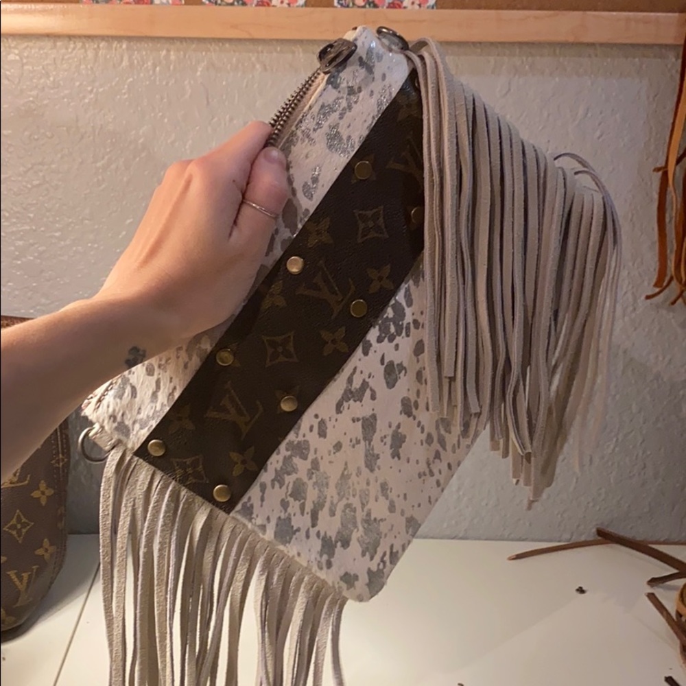 Recycled LVcanvas on a Fringed crossbody clutch
